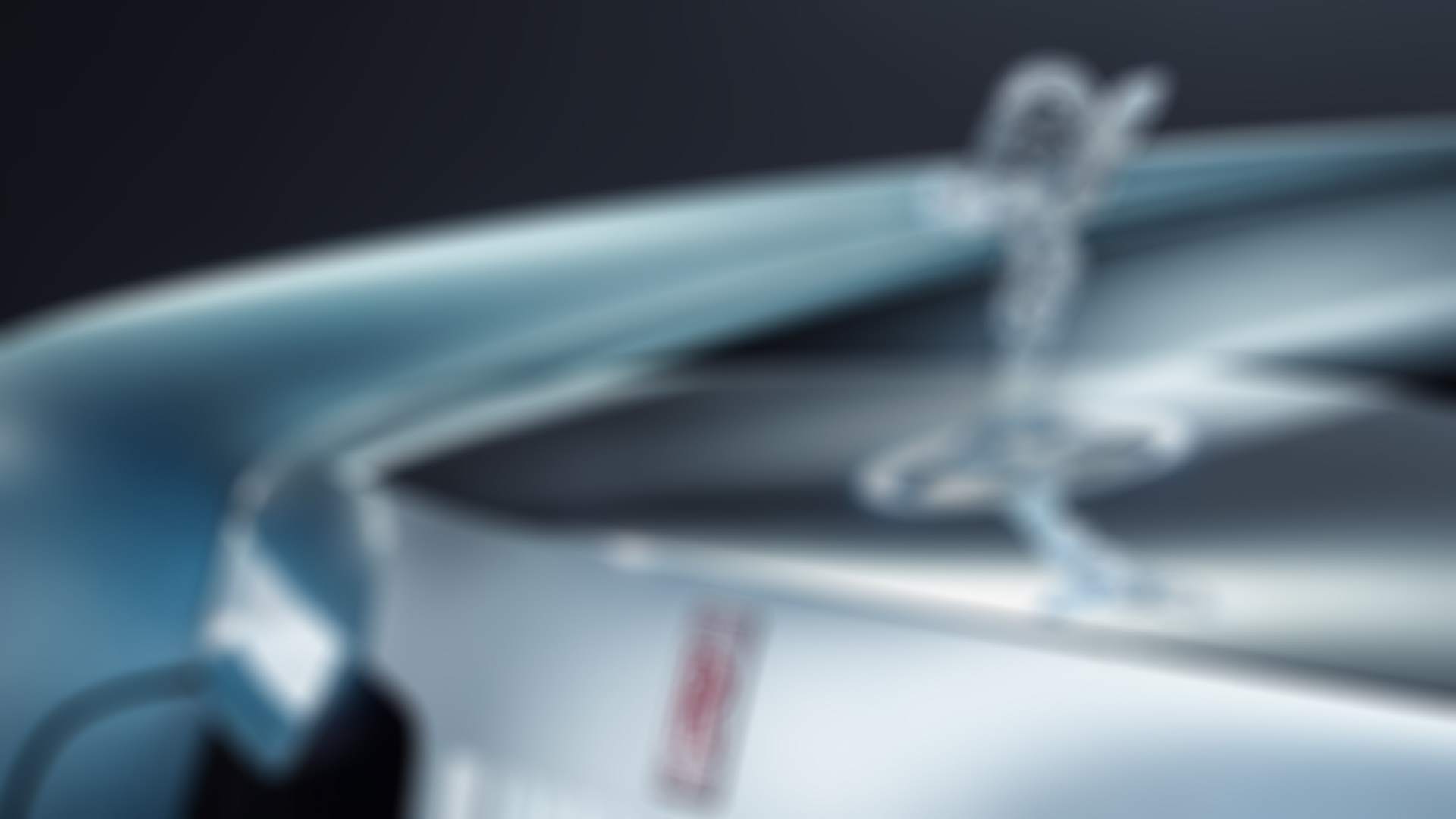 A close up shot of Rolls-Royce's famous spirit of ecstasy emblem on the vision Rolls-Royce 103EX.