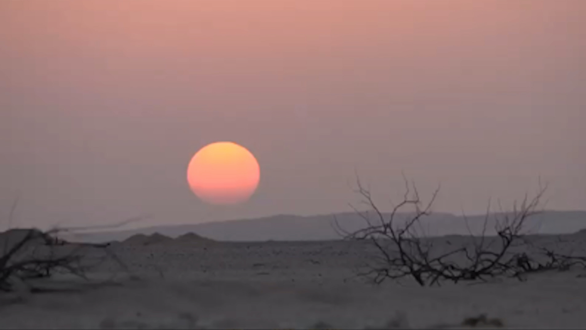 A photo of the sun during sunset