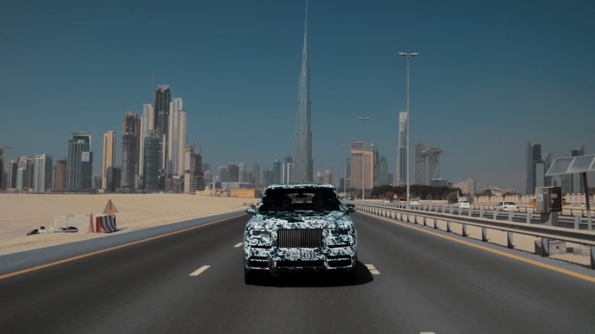 A Rolls-Royce Cullinan driving in a road in United Arab Emirates
