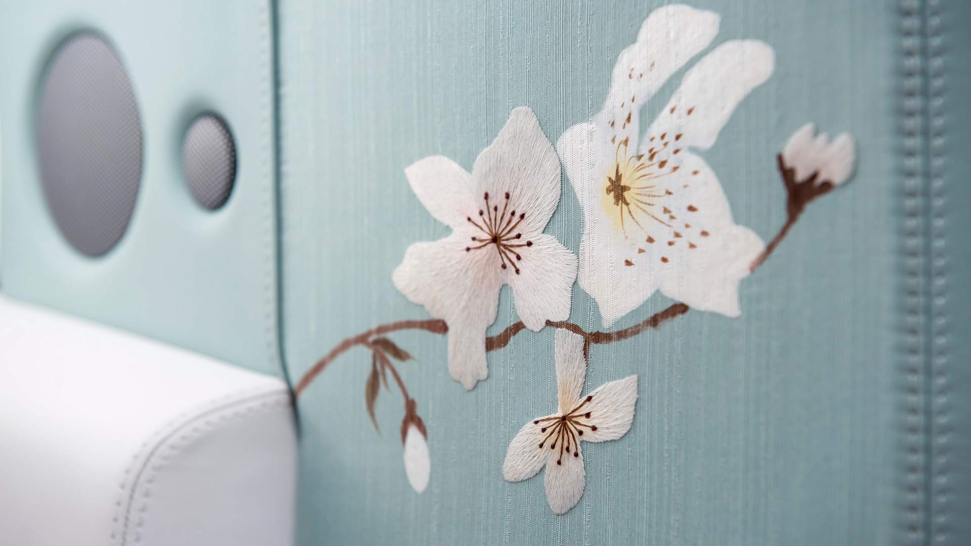 Detail of the hand-painted blossom trees that adorn the interior of the Rolls-Royce Serenity Phantom