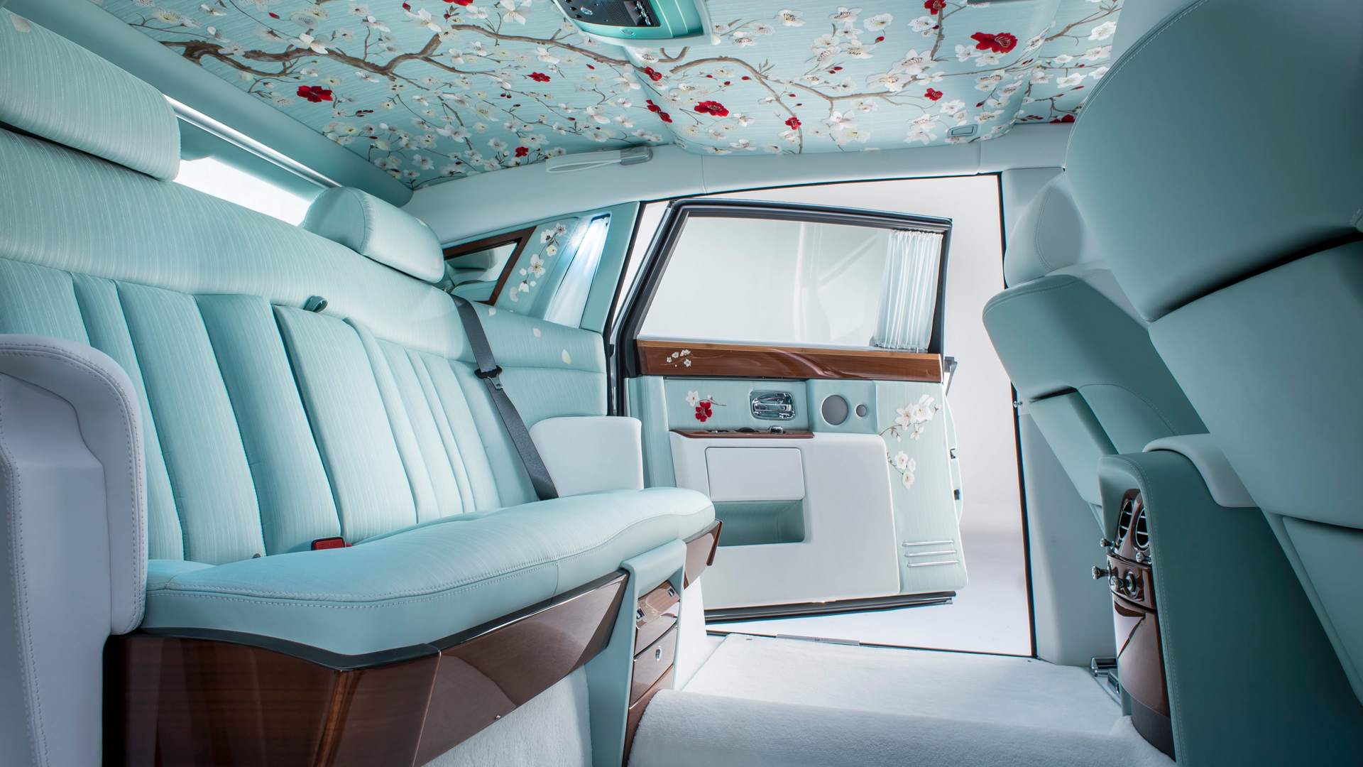 Interior shots of Rolls-Royce Phantom with cherry blossom embroidery, inspired by Serenity Textile Maven