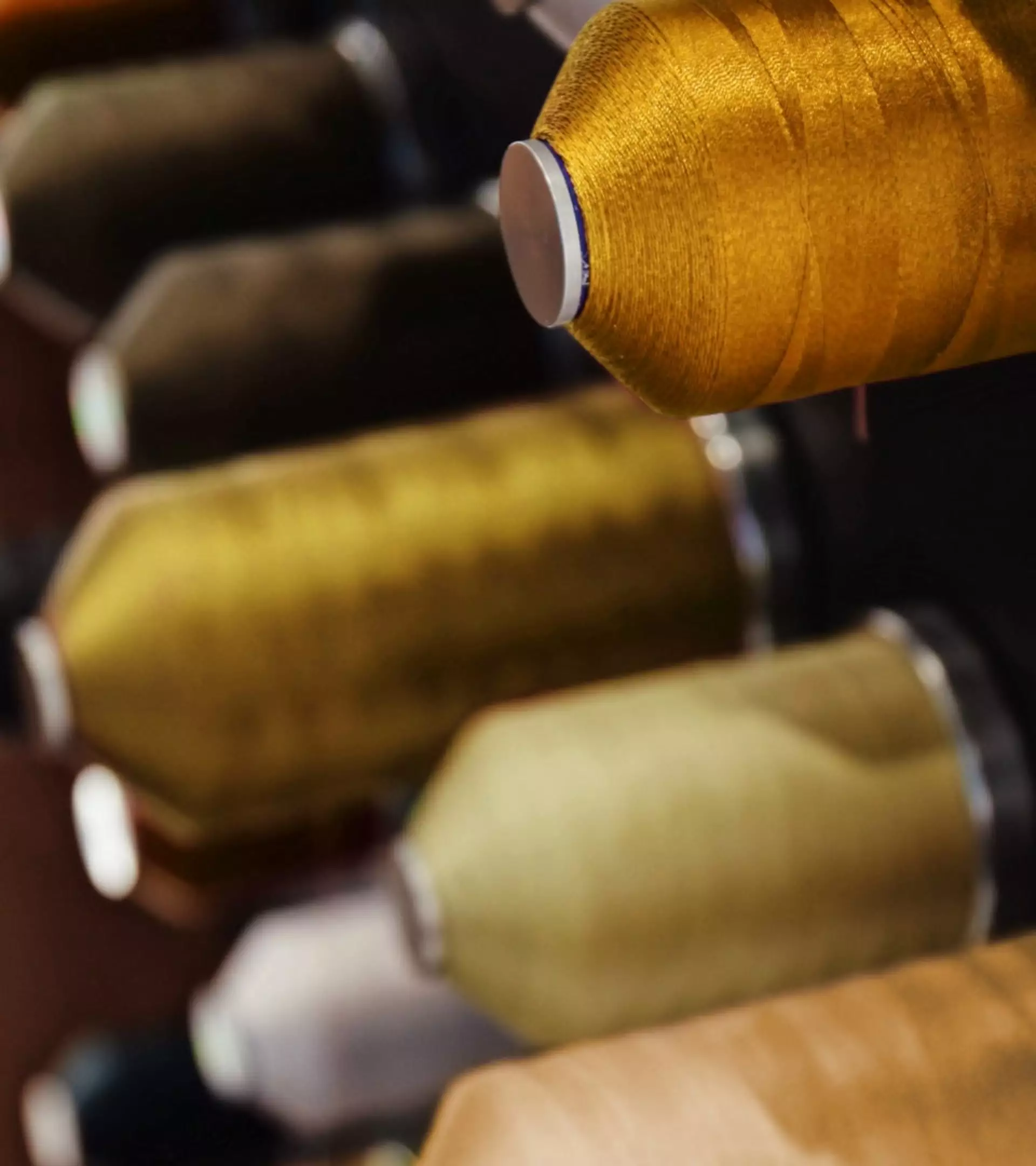 Meticulously colour-matching and testing the leather embroidery thread to capture the essence of Forge Yellow
