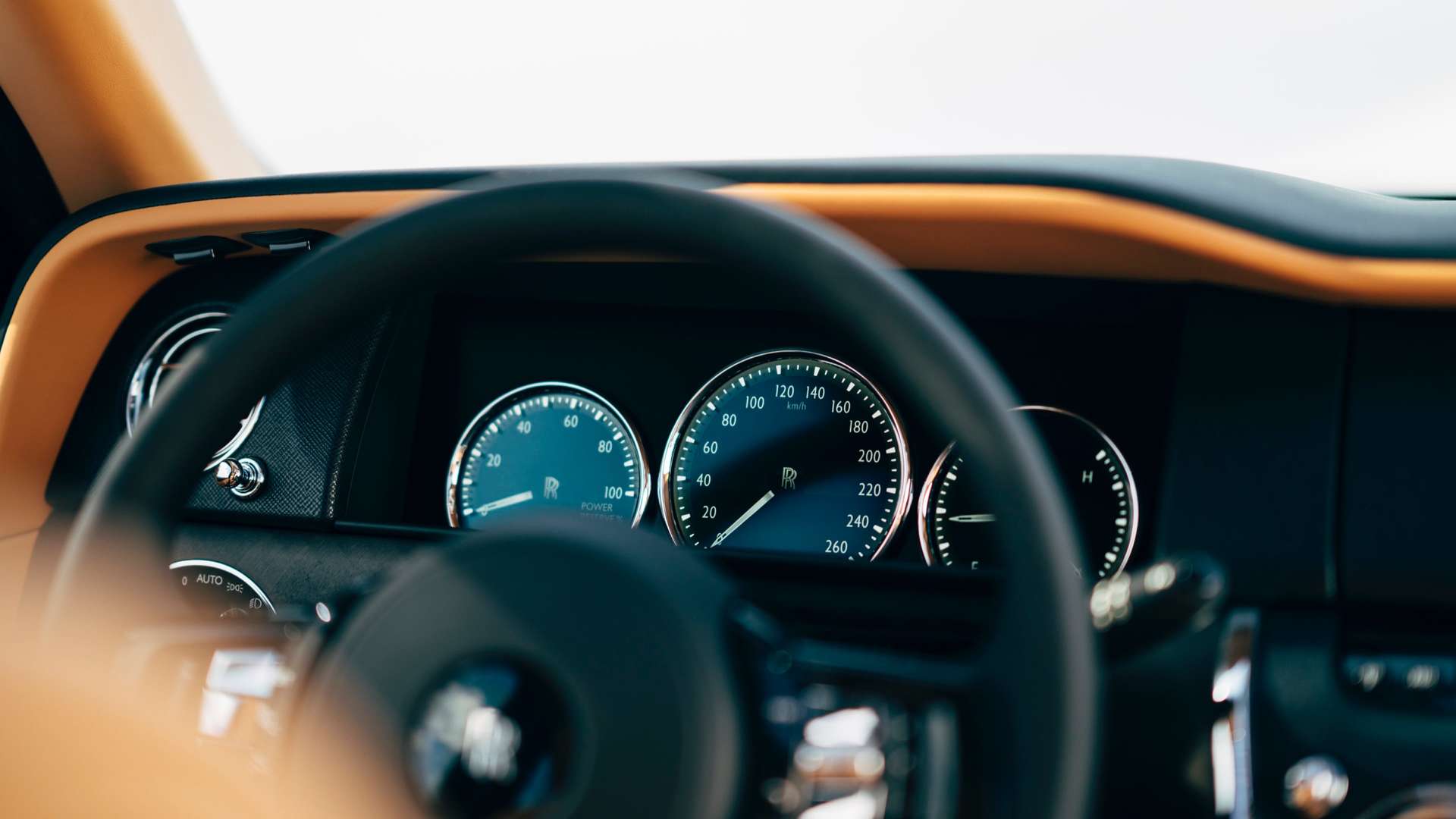 The digital dials of and steering wheel of the Rolls-Royce Cullinan.
