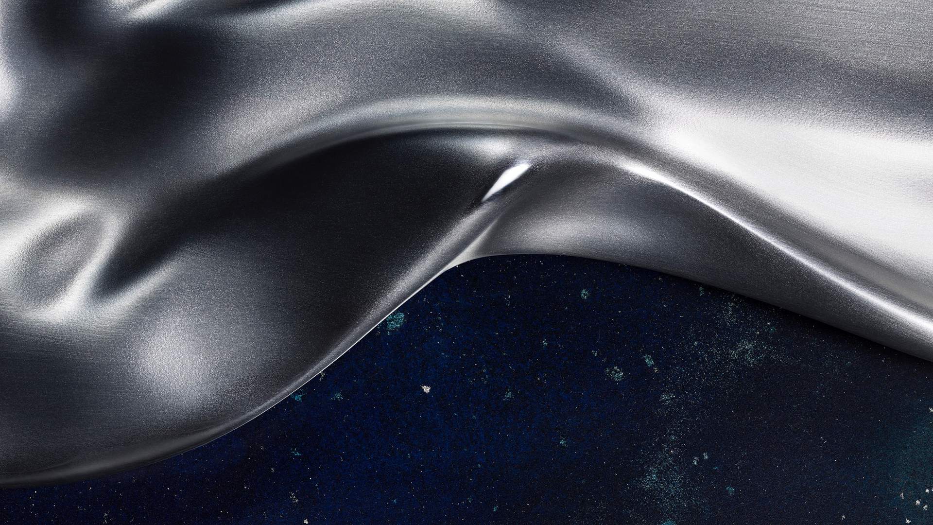 Abstract image of flowing metallic material