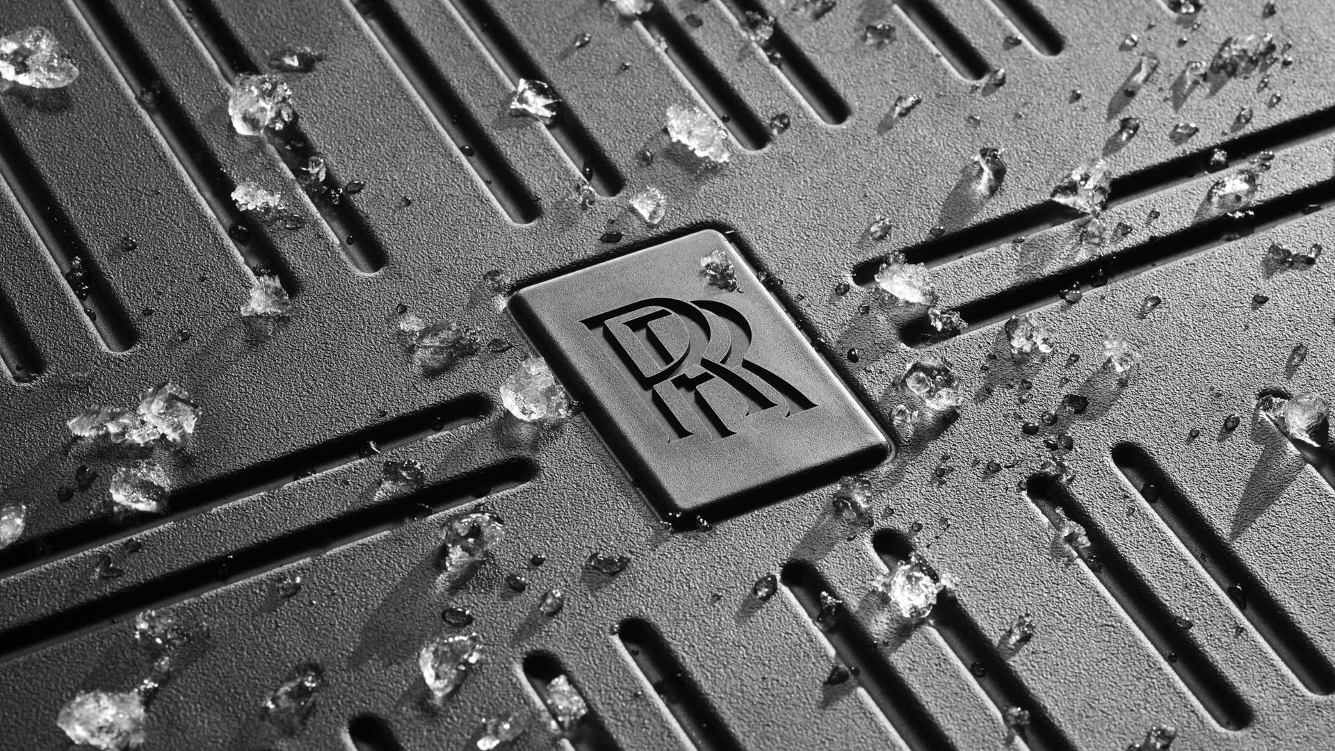 Rolls-Royce all weather floormats, sculpted with raised edges in a robust rubber with monogram