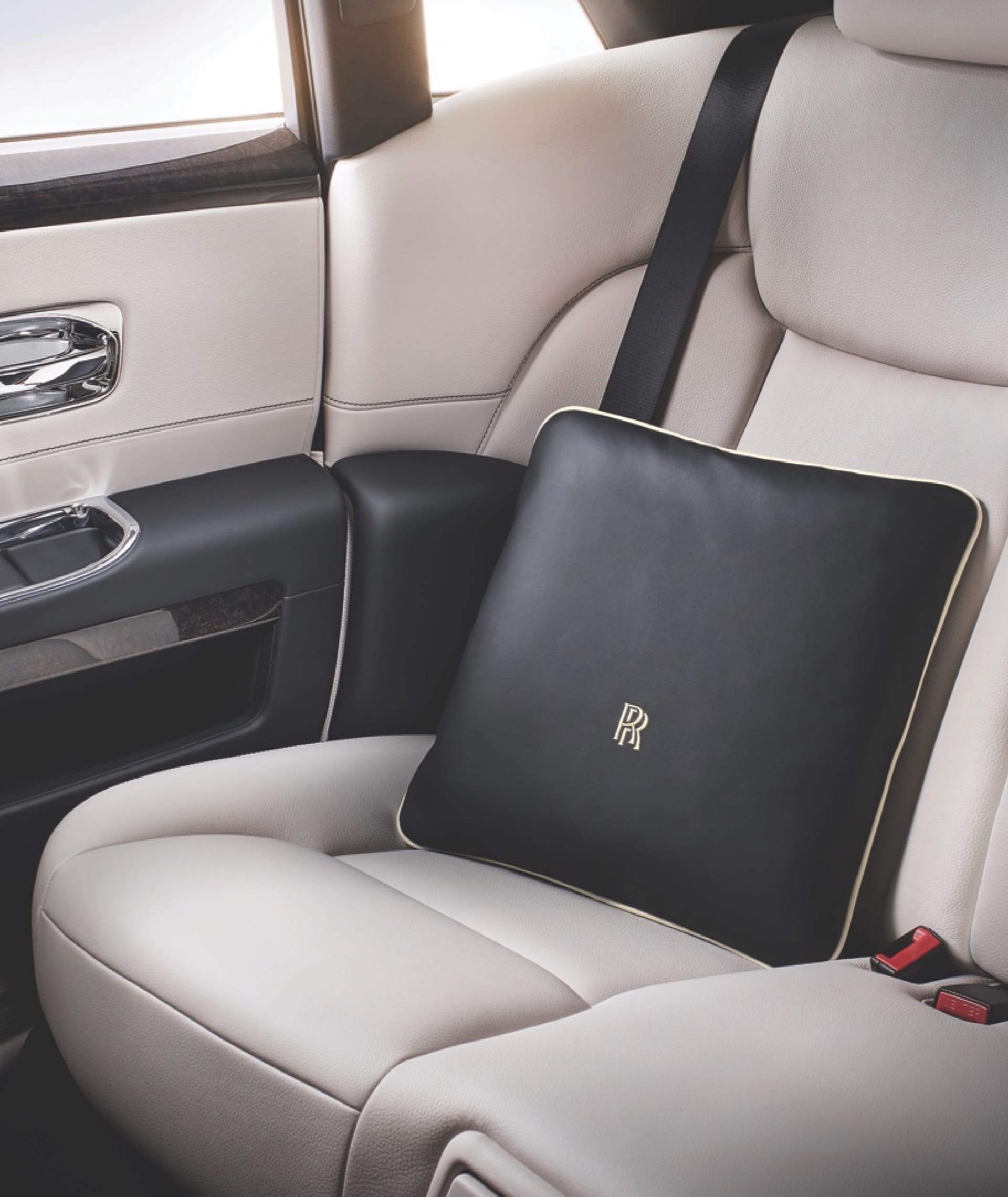 Bespoke duck feather cushions constructed from the finest leather inside a Rolls-Royce motor car