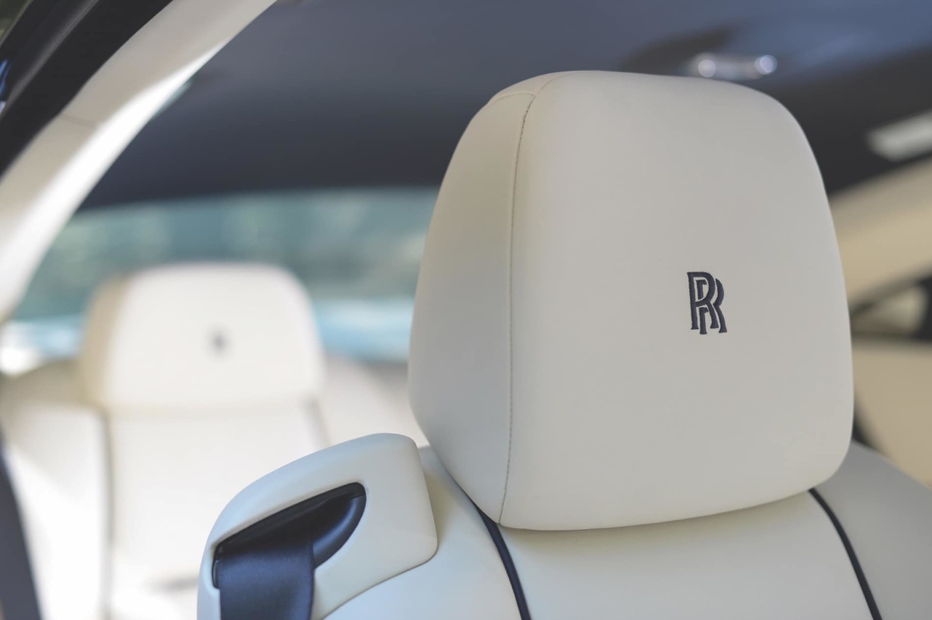 Personalised headrest in a bespoke Rolls-Royce motor car