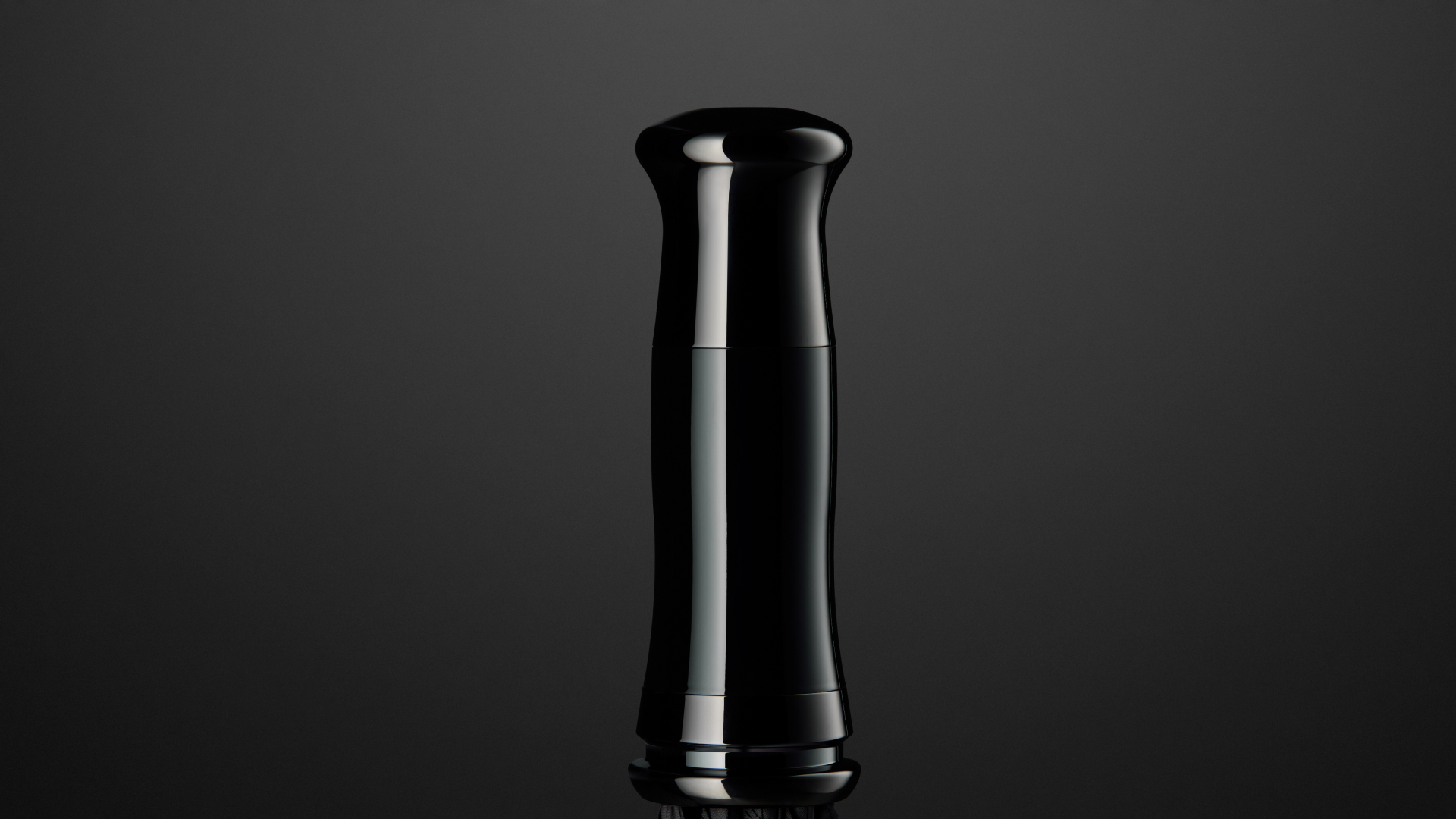 Rolls royce black umbrella with a stylish black chrome handle.