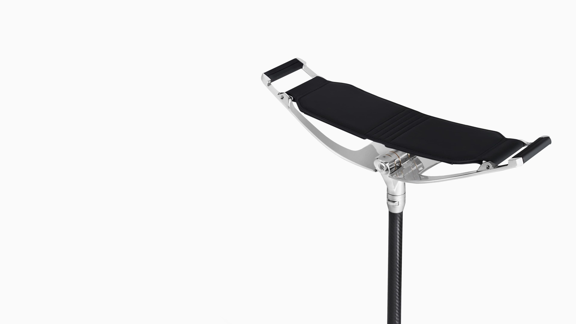 The Rolls-Royce Pursuit Seat with contemporary polished aluminium frame, carbon fibre shaft and padded natural grain leather seat