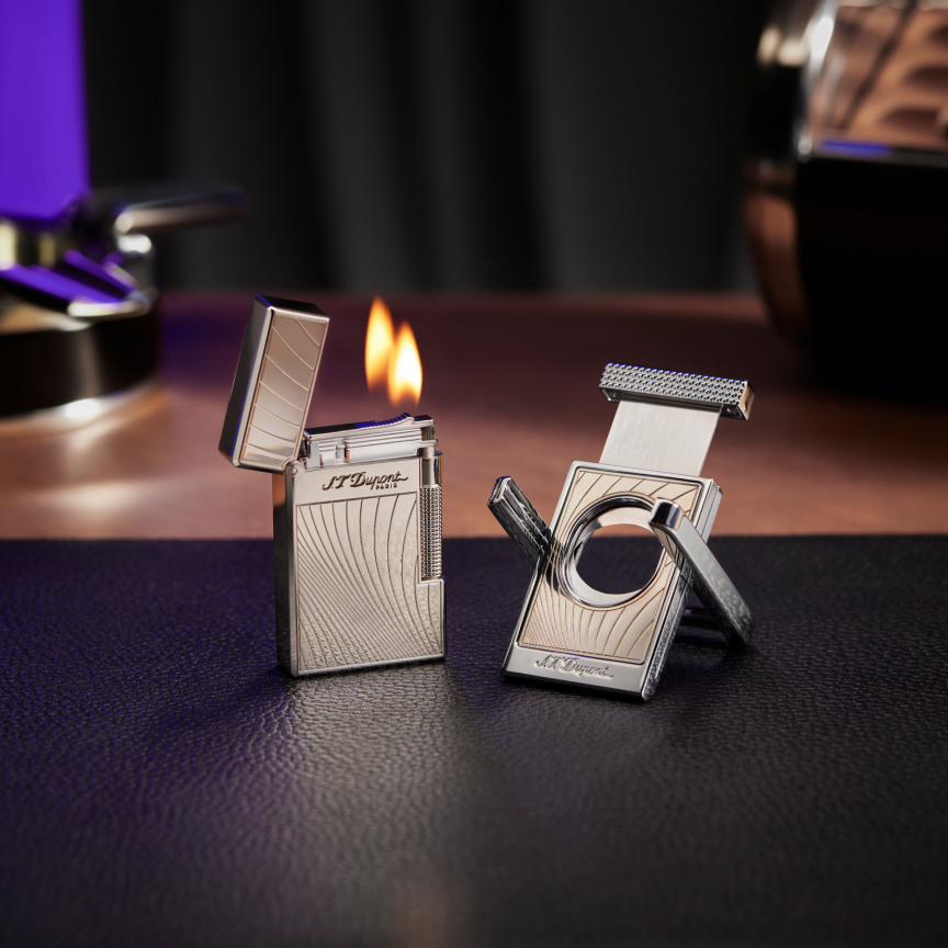 <p>对于雪茄爱好者而言,雪茄剪与打火机是必不可少的伴侣。这套雪茄剪与打火机设计精美,安置于一个精品盒内,与雪茄盒及其他休闲配件相映成辉。</p>