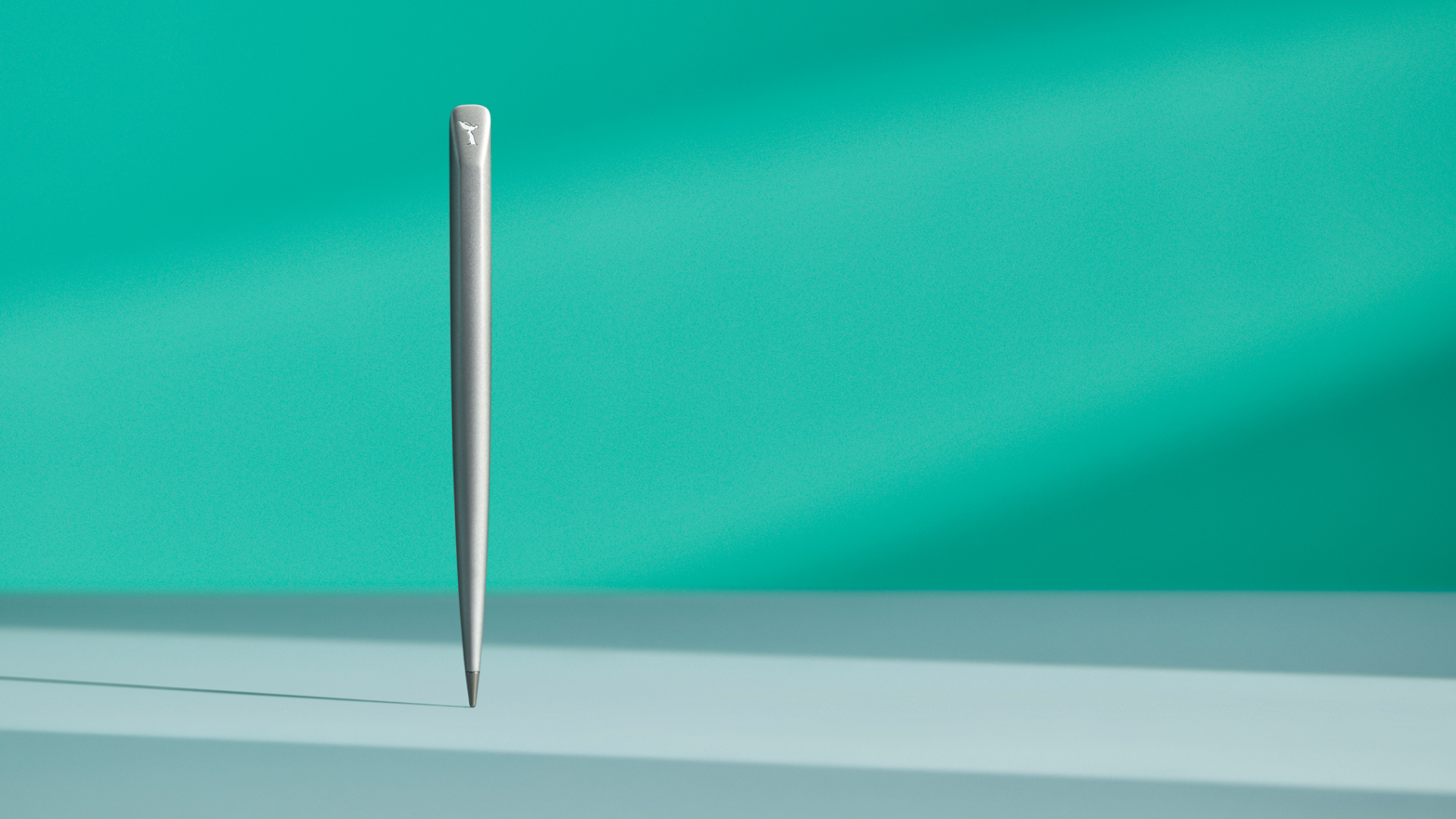 Rolls-Royce Infinity Stylus in silver finish standing over a desk