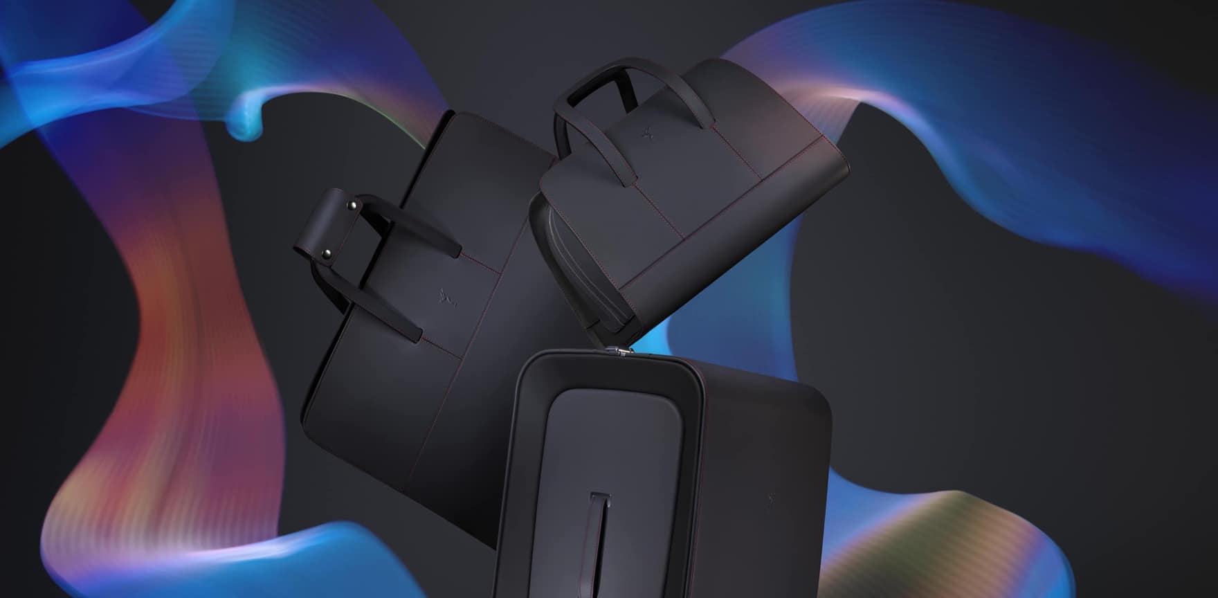 3 pieces of luggage from the Rolls-Royce Kinetic Luggage Collection float above abstract flowing colours
