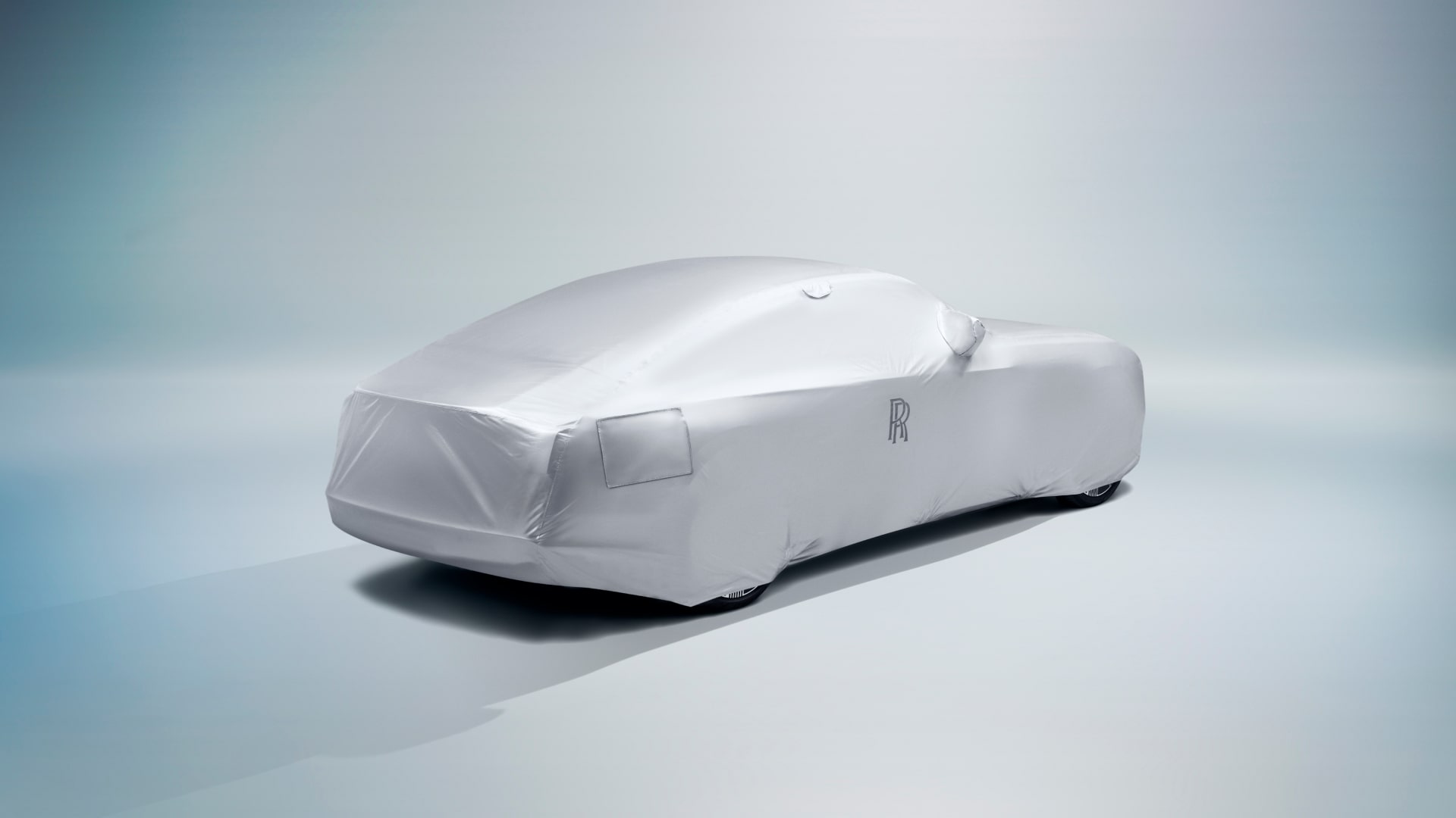 Back view of the Rolls-Royce tailored outdoor car cover in silver colour