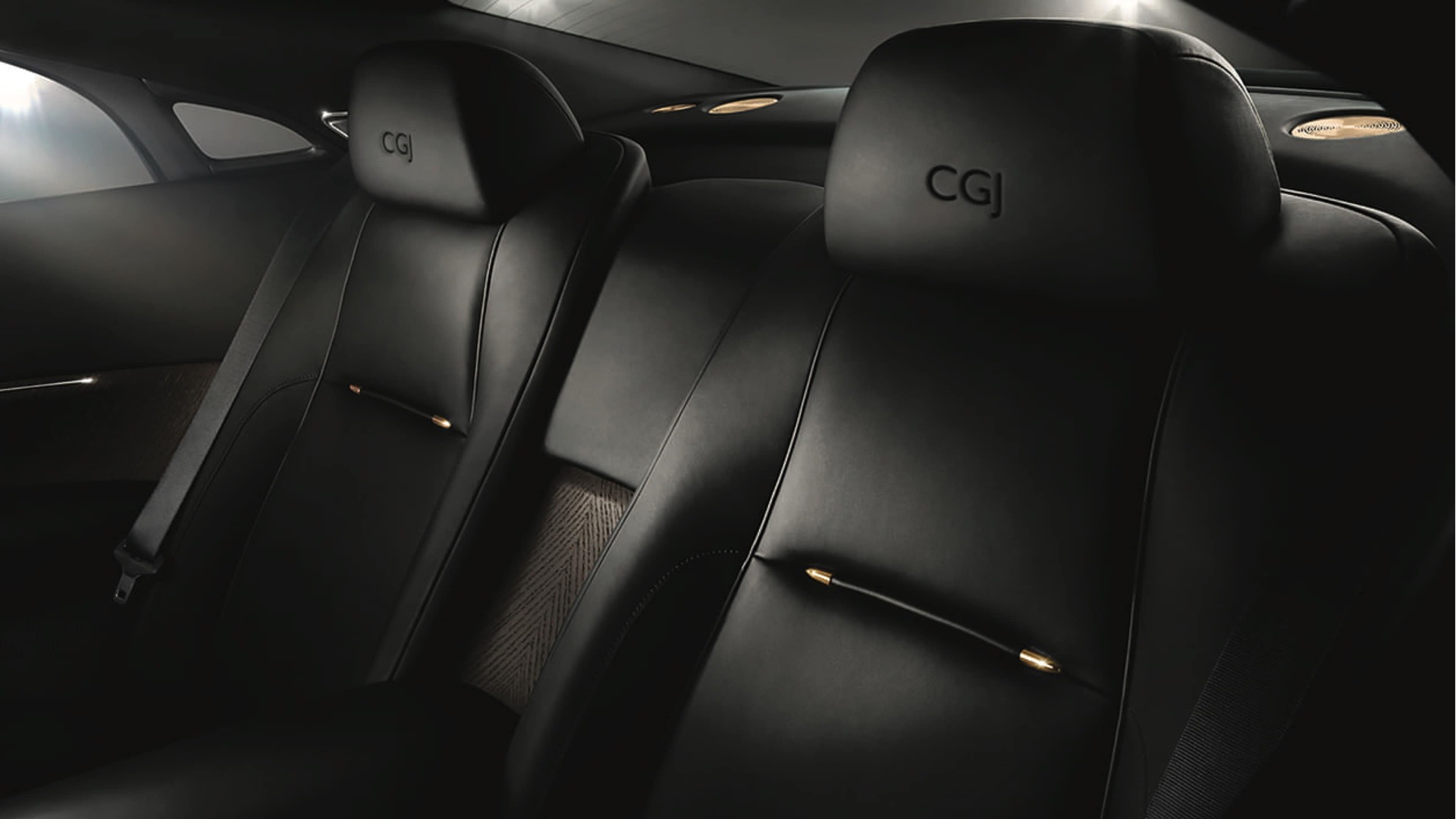 Rolls-Royce motor car headrests with elegantly embroidered personalised lettering