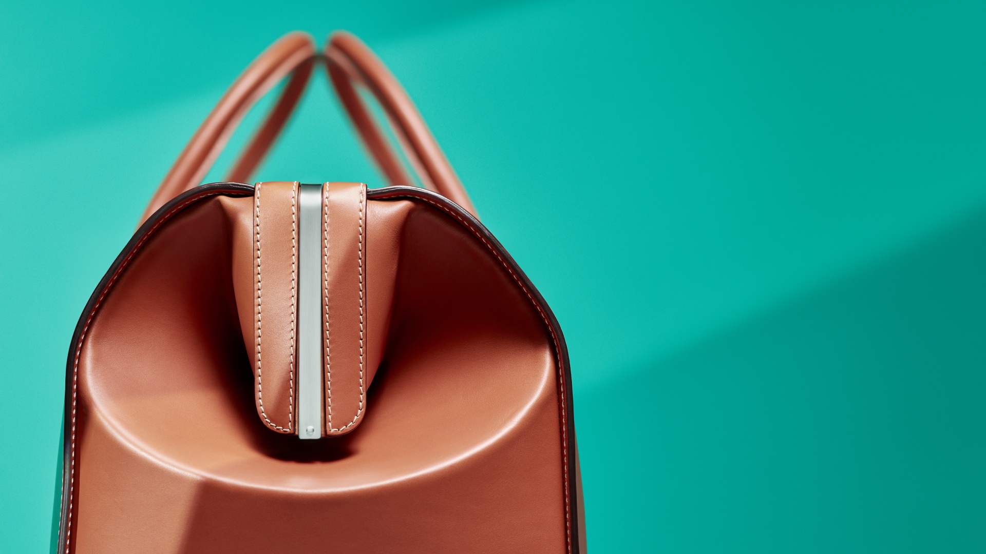 Side view of the weekender from the Rolls-Royce Icon Luggage collection