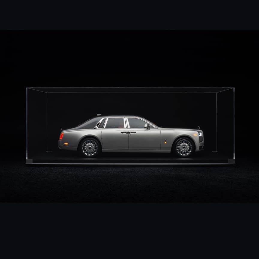 Exterior side view of 1:8 scale model of the Rolls-Royce Phantom motor car in glass viewing case