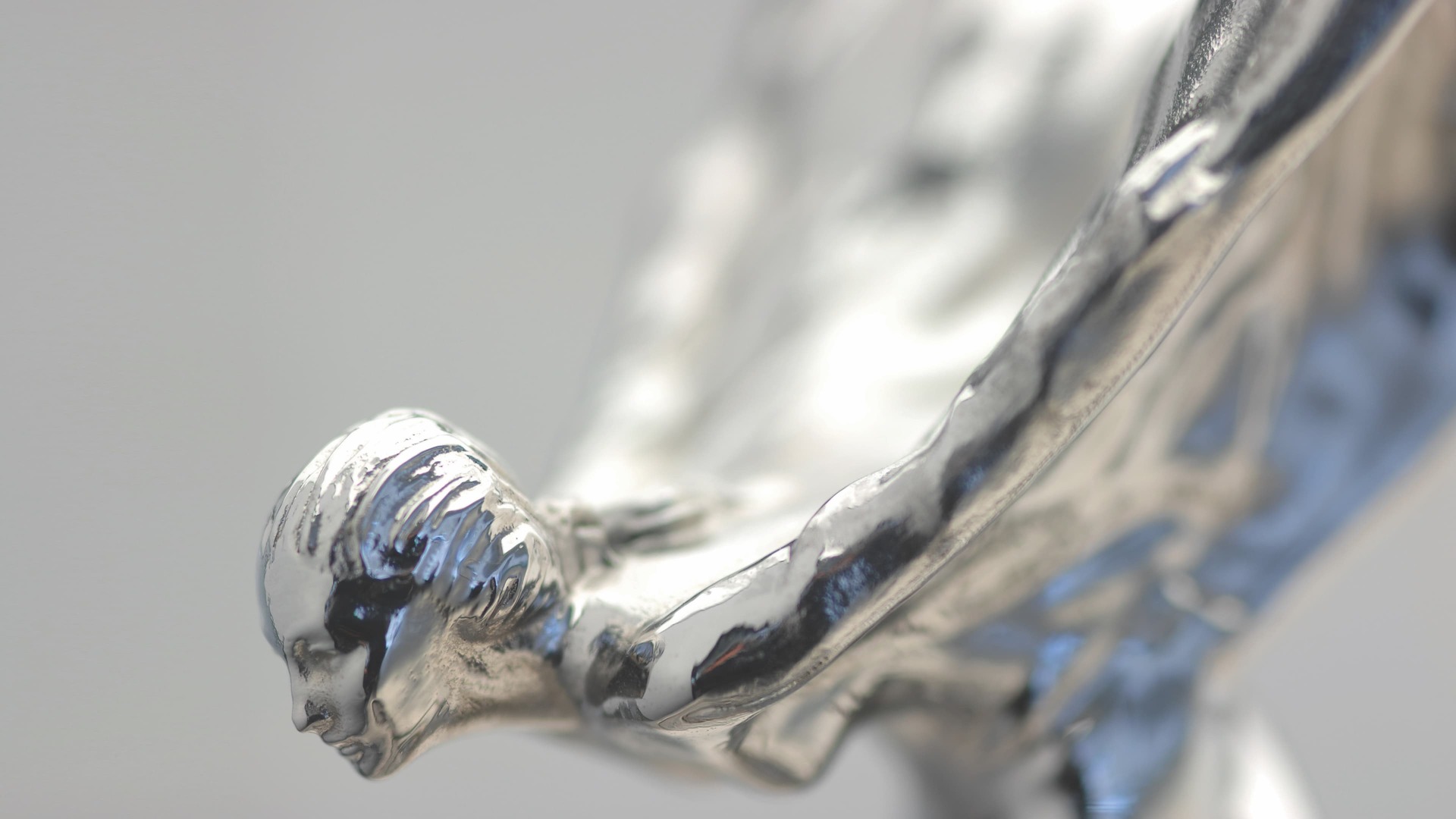 A close-up shot of the solid silver Spirit of Ecstasy
