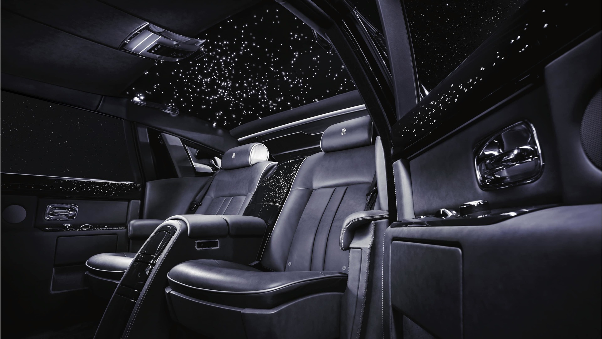 Interior of Rolls-Royce motor car with starlight headliner creating the illusion of a star-filled night sky