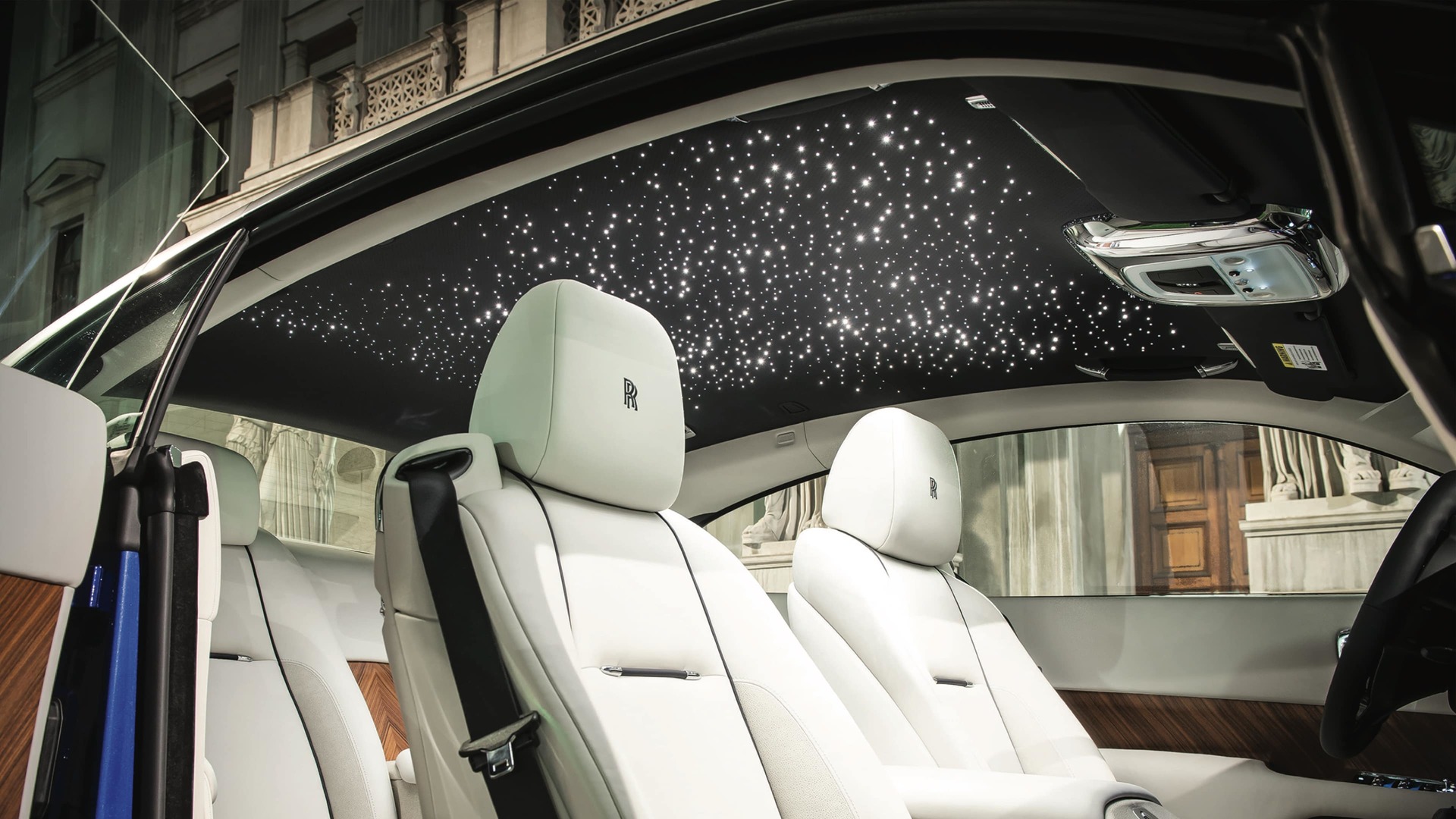 Interior of Rolls-Royce motor car with starlight headliner creating the illusion of a star-filled night sky