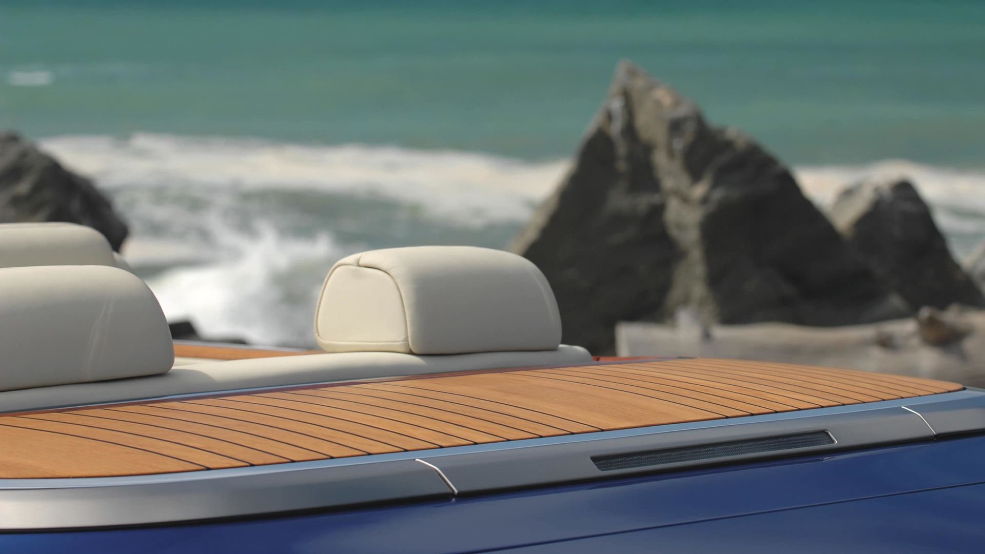 Rear Teak Decking detail on drophead coupé Rolls-Royce motor car by the sea