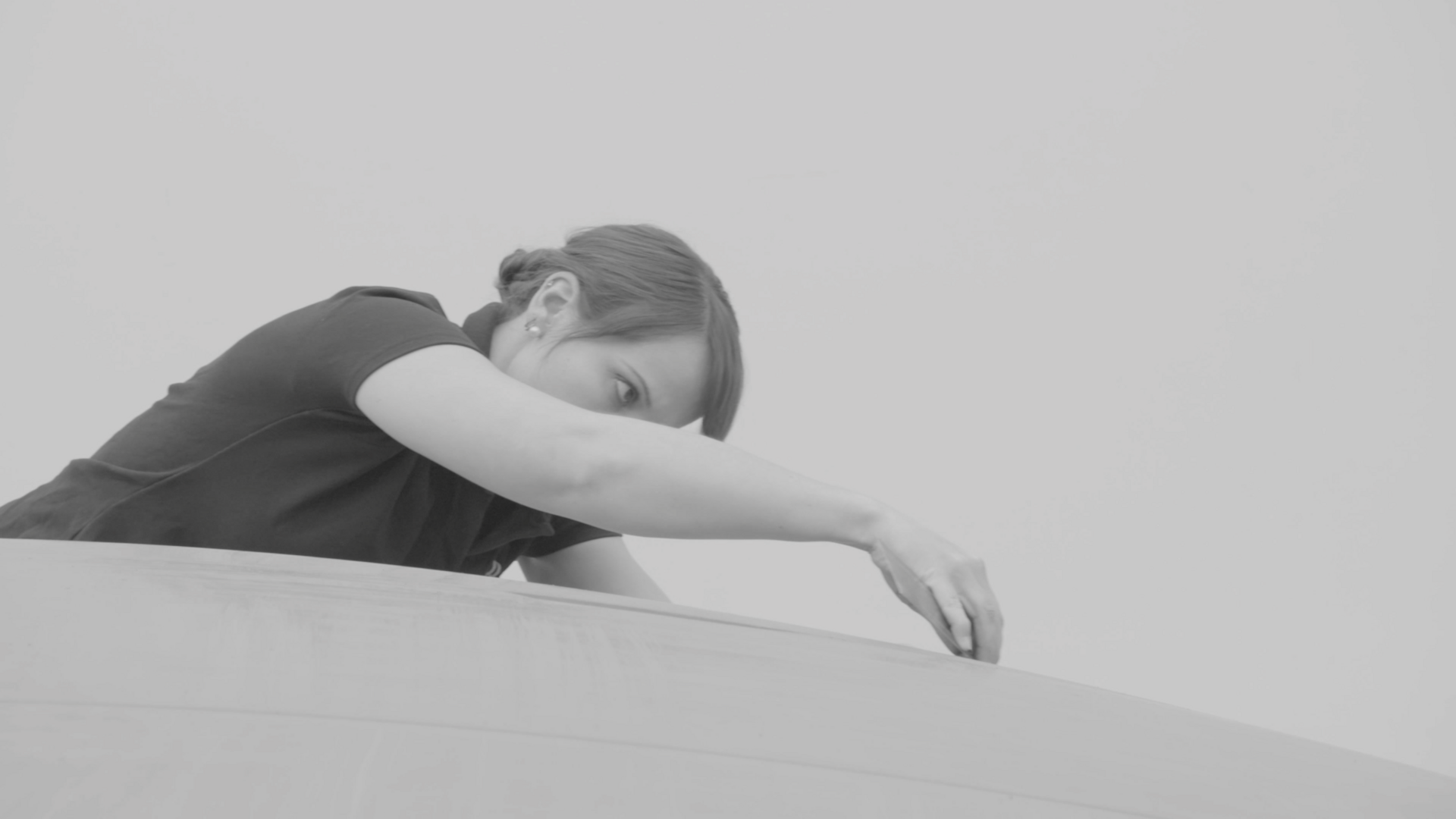 black and white image of a woman working on the making of Boat Tail