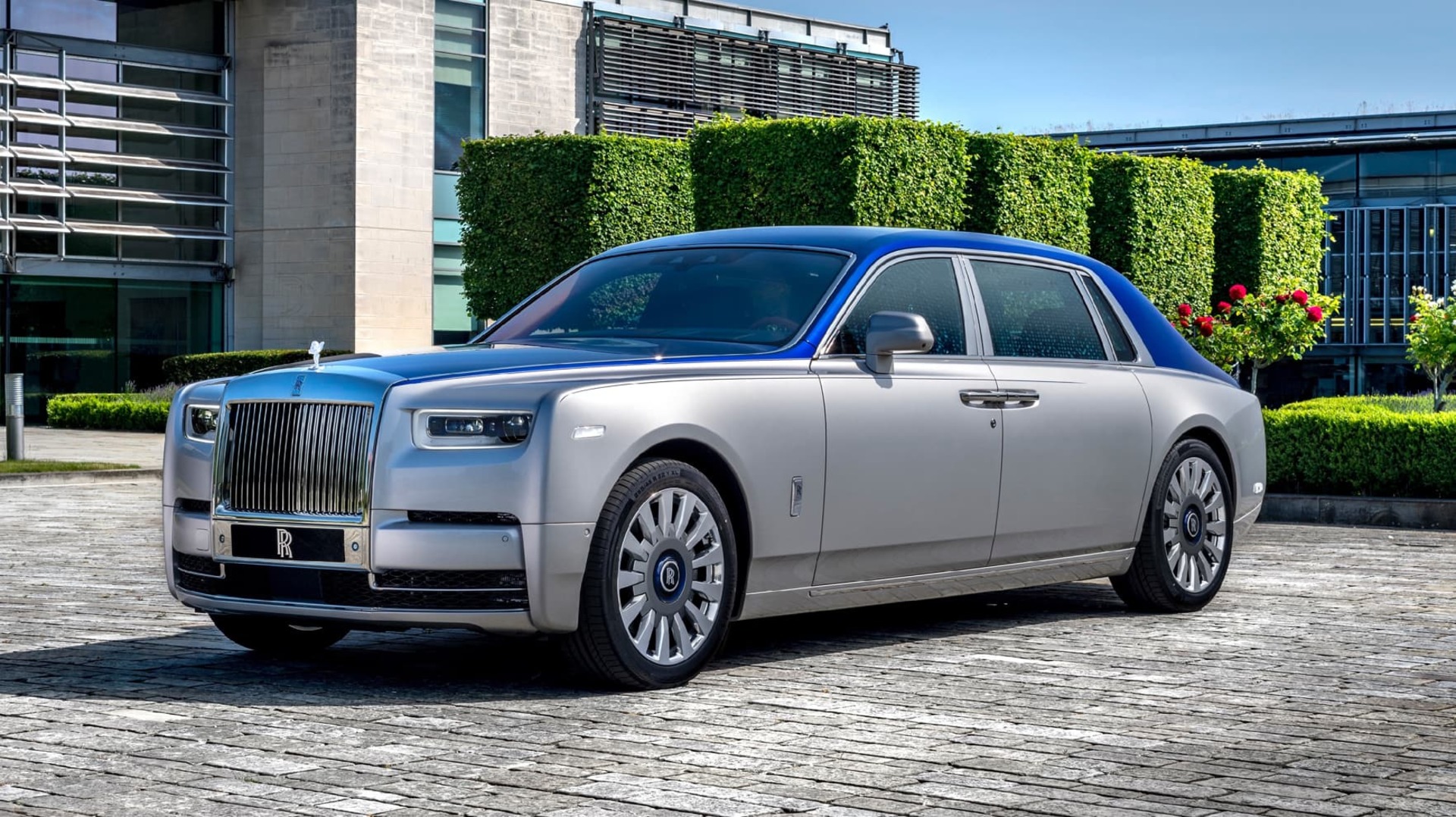 3/4 front exterior of stationary Rolls-Royce Phantom Extended motor car within Goodwood grounds