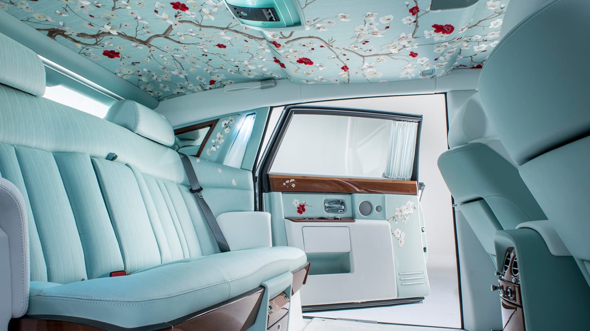 Interior of bespoke Rolls-Royce Serenity Phantom, upholstered with the finest imported silk and detailed with hand-painted blossom trees