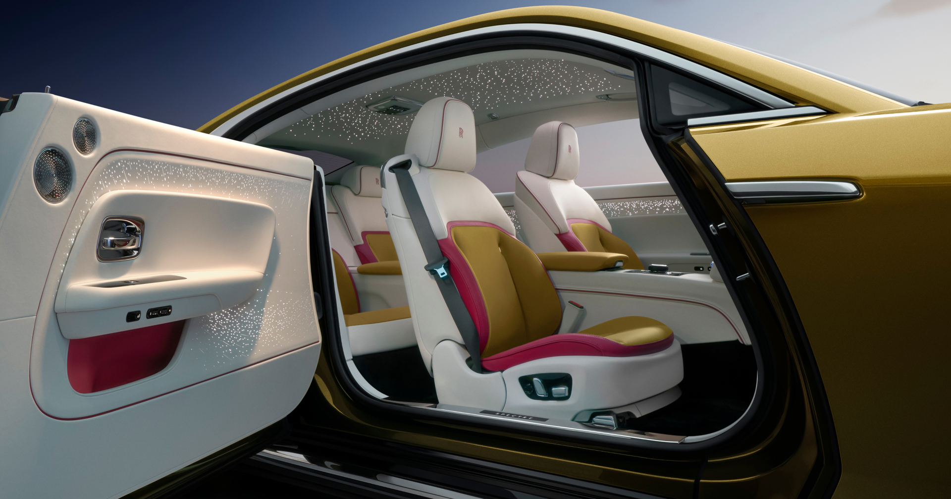 Interior shot of the gold Spectre showing the extravagant  pink, gold, and white colour combination.