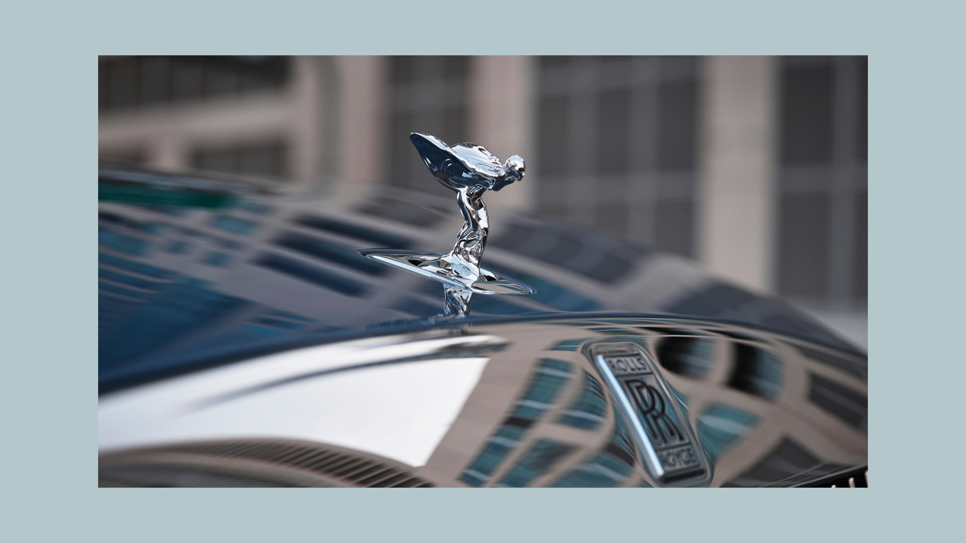 Close up view of the Spirit of Ecstasy on top of a Rolls-Royce Spectre