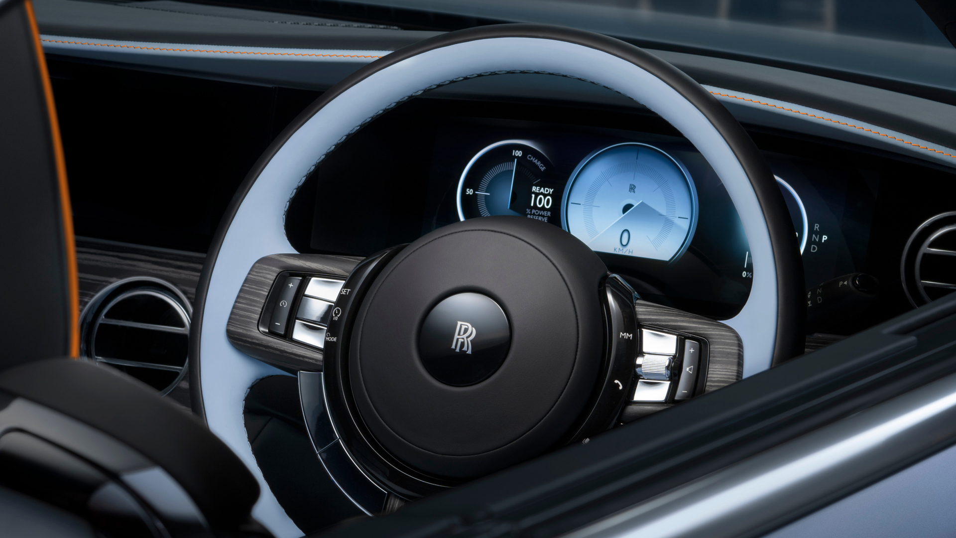 Detail view of the Spectre’s Bespoke Instrument Dials creating a perfectly harmonised aesthetic overall.