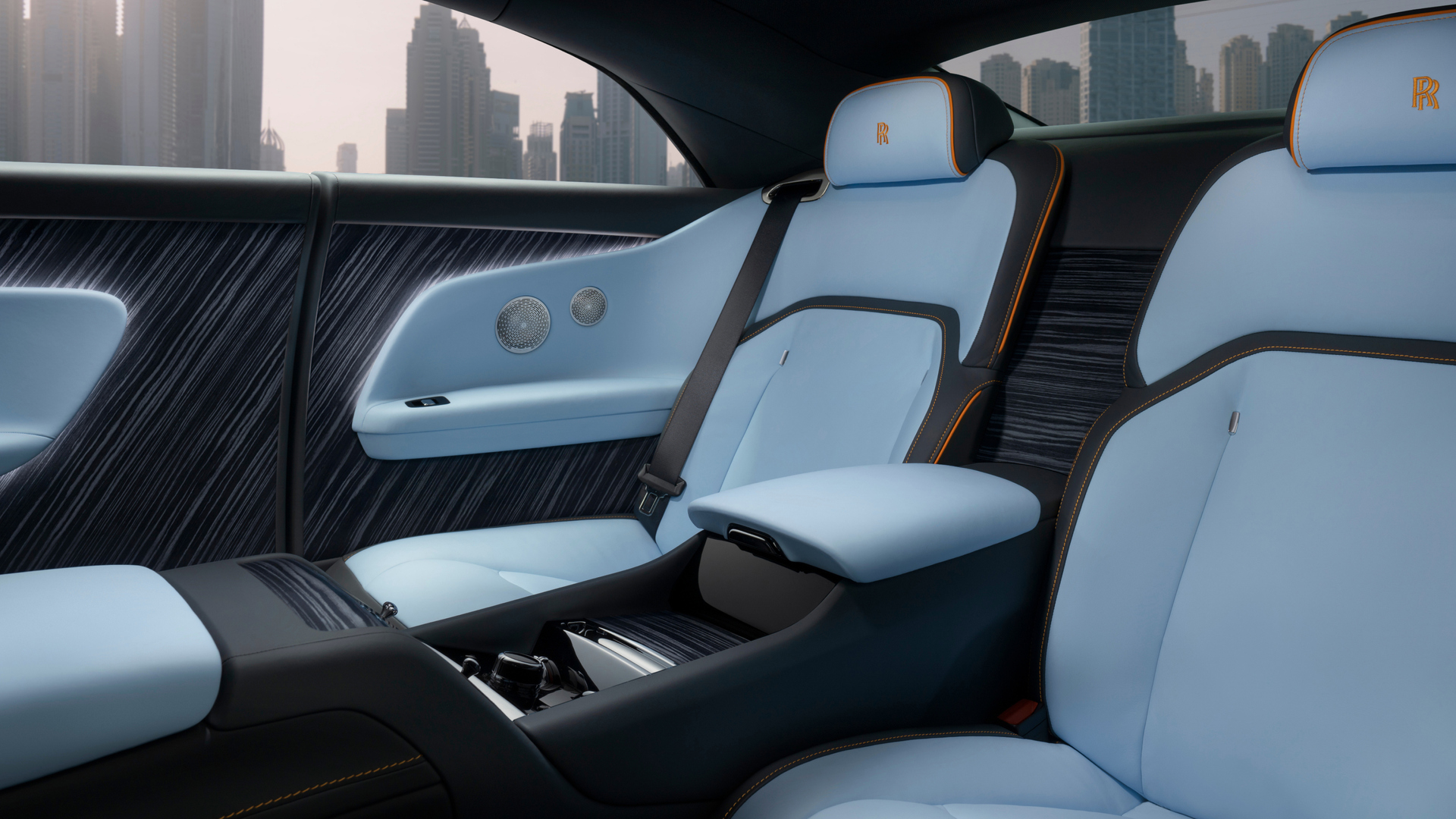 Interior view of the Rolls-Royce Spectre car displaying canadel panelling in Sindora Wood
