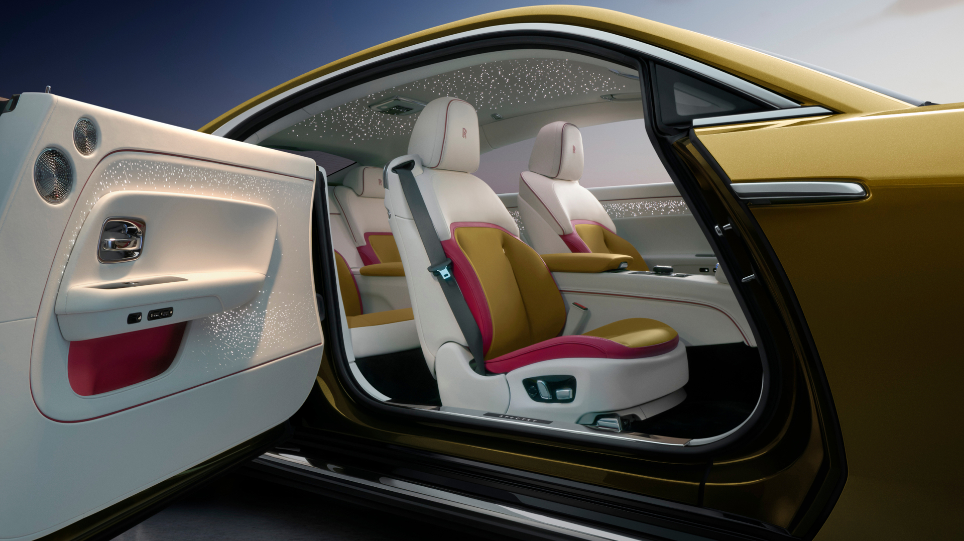 Interior shot of the gold Spectre showing the extravagant  pink, gold, and white colour combination. 