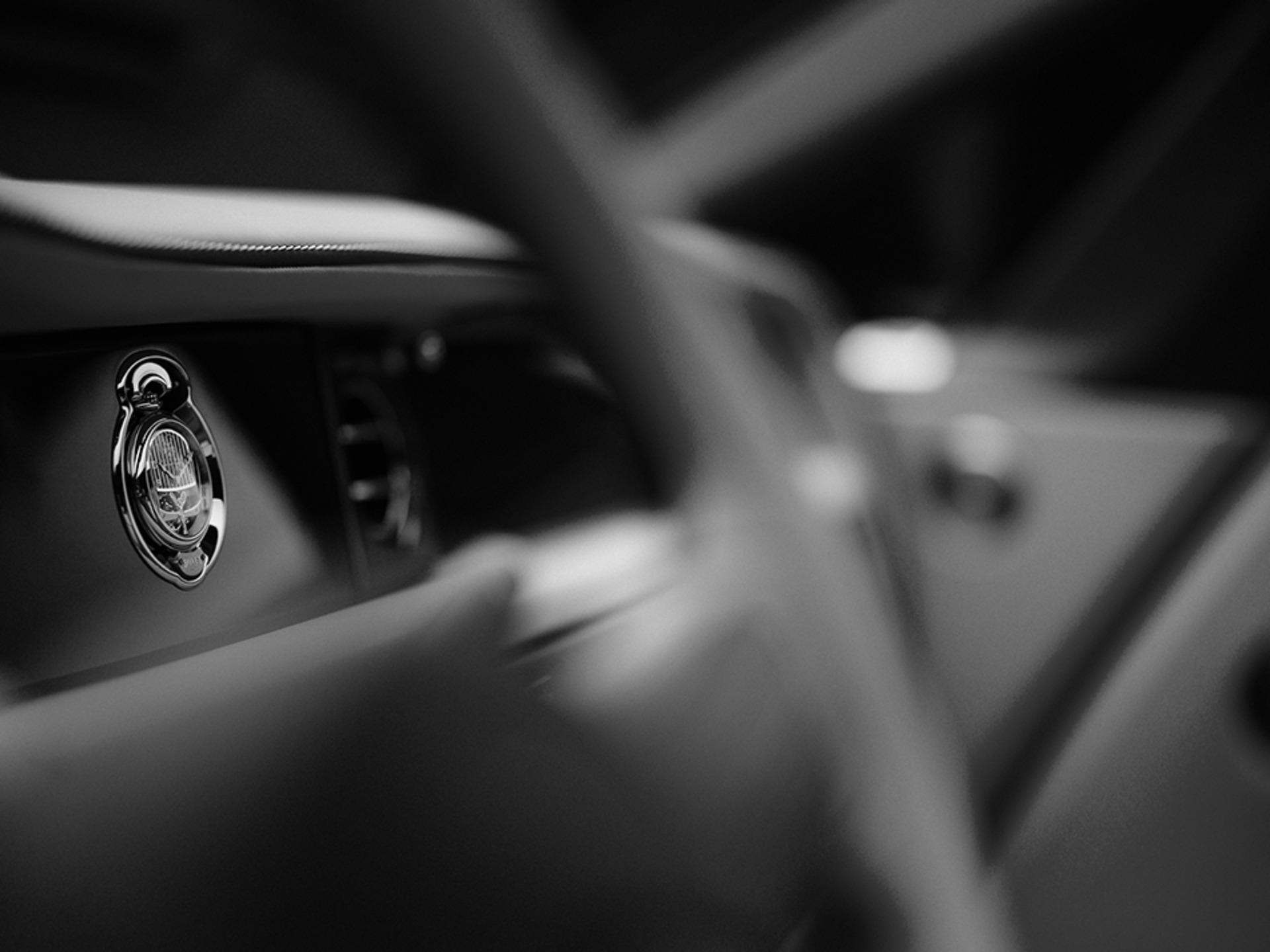 A close up of the car clock placed within the fascia. 