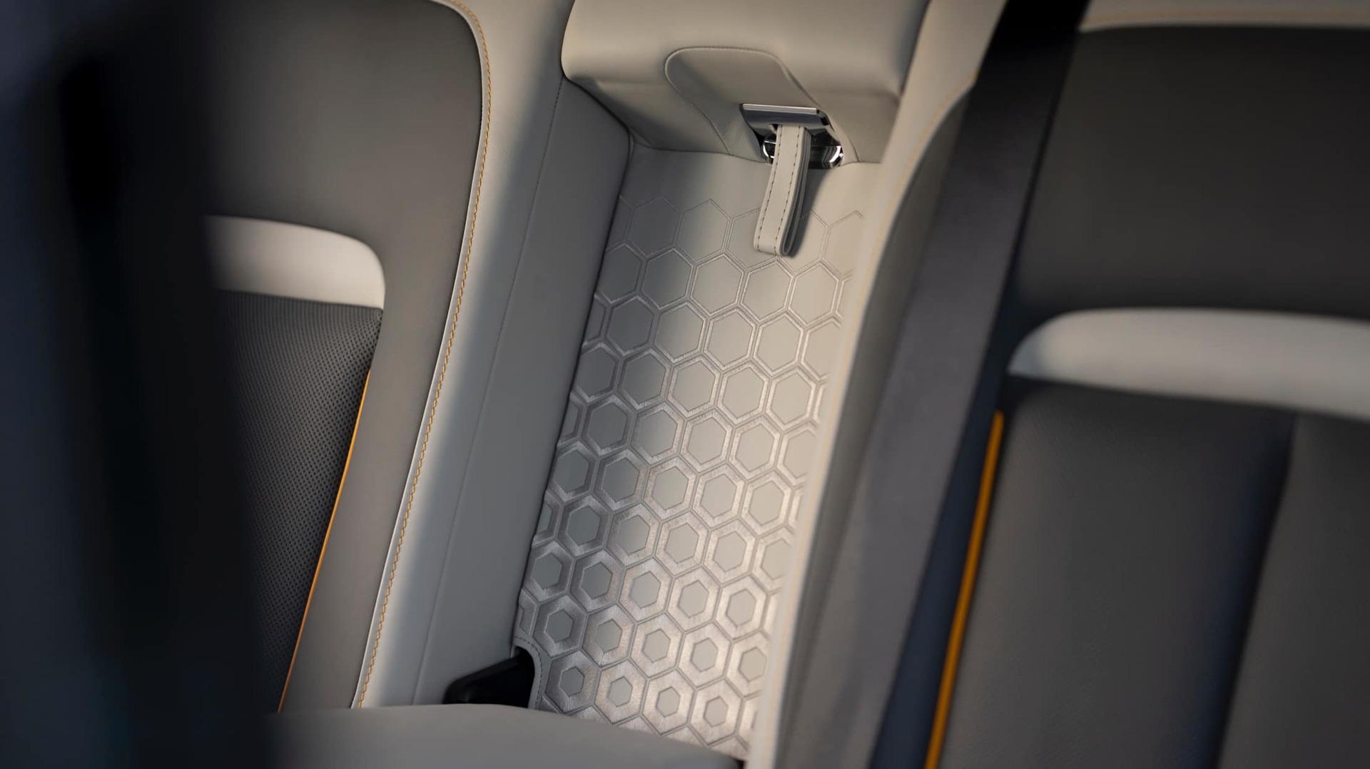 Geometric and intricate honeycomb hex pattern detailing in the bespoke Rolls-Royce Black Badge Cullinan Capella motor car