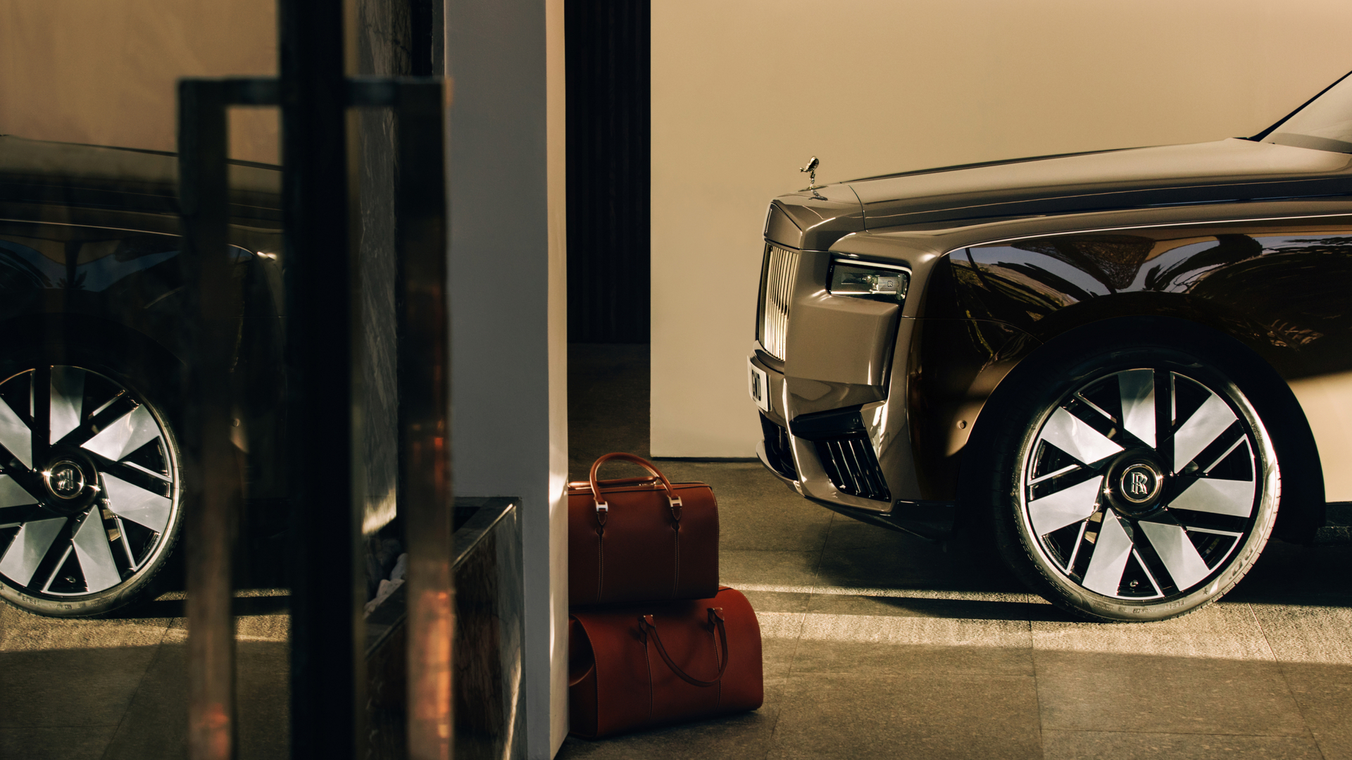 Cullinan Series II parked next to the weekend bag