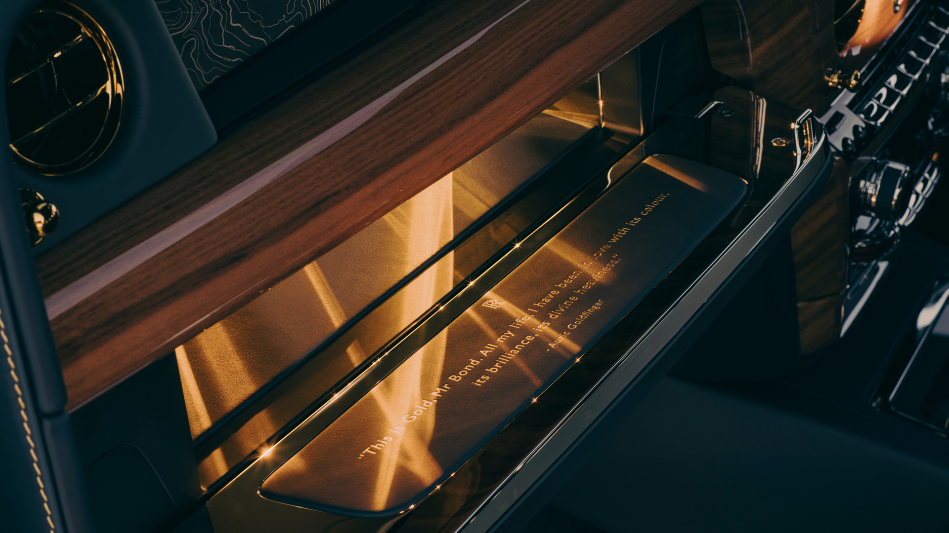 Image showing the beautiful gold glovebox of the Phantom Goldfinger.